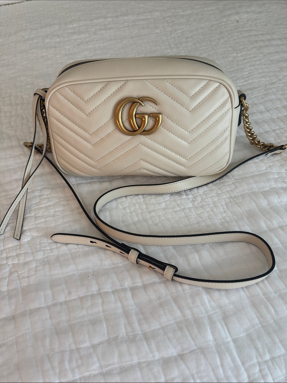 Gucci GG Marmont Small Camera Bag. Structured chevron-quilted leather crossbody,